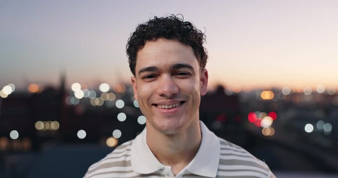 Face, smile and man in city at night for travel, tourism and sightseeing for holiday in town. Bokeh, portrait and person with laugh, confidence and happy on vacation, weekend break or evening outdoor