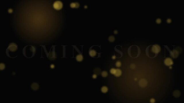 Elegant Golden Coming Soon Text Animation with Sparkling Bokeh Particles on a Black Background