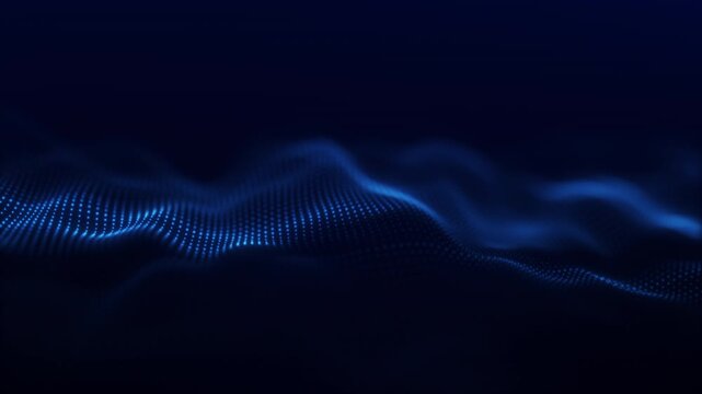 Abstract blue particle wave flowing across a dark background with soft depth and luminous dots, perfect for technology, data visualization, futuristic motion, and digital design projects.