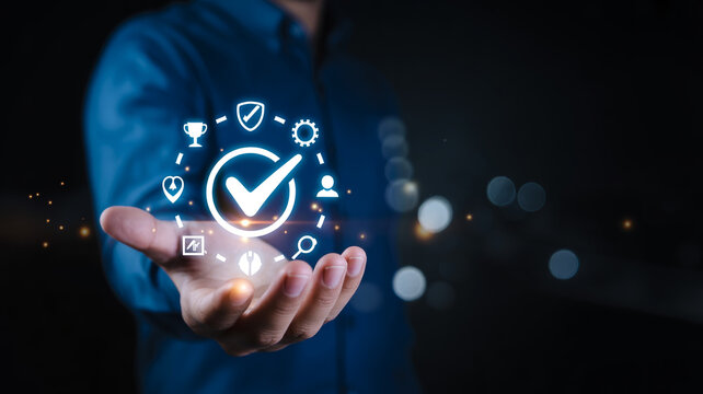 Business professional holding digital quality control and standard compliance icon symbol.