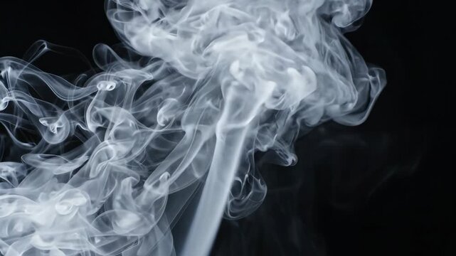 White smoke rising and swirling on dark black background for abstract overlay content