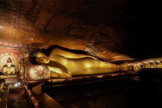 Reclining Buddha statue inside Dambulla Cave Temple, UNESCO World Heritage Site, Sri Lanka
