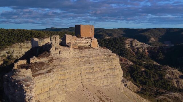 Aerial view from a drone of Sora Castle, ruins of a medieval fortress on the top of a rocky hill near the village of Castej&oacute;n de Valdejasa, Cinco Villas region, province of Zaragoza, Aragon, Spain, Eu