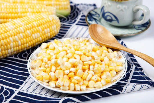 Fresh Bi Color Sweet Corn Cobs On White Textured Plate