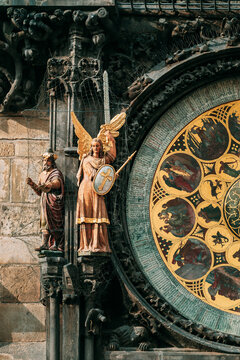 Angel statue on the Prague Astronomical Clock calendar dial