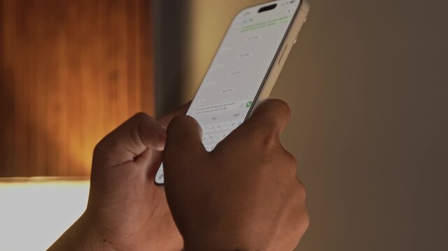 Man hands chatting and typing on smartphone macro closeup. Unrecognizable human typing text message tapping touchscreen keyboard using whatsapp application a social media
