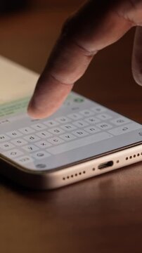 Man hands chatting and typing on smartphone macro closeup. Unrecognizable human typing text message tapping touchscreen keyboard using whatsapp application a social media