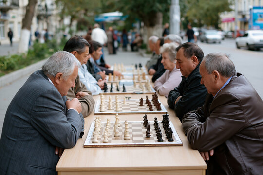 Chess players compete on the street in the city