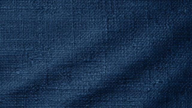 Dark blue fabric texture. Denim cloth background.