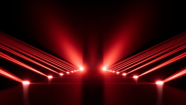 Symmetrical red stage lighting with converging laser beams over illuminated walkway and bright spotlights against deep black background, creating dramatic concert atmosphere with glowing perspective