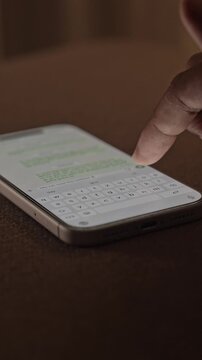 Man hands chatting and typing on smartphone macro closeup. Unrecognizable human typing text message tapping touchscreen keyboard using whatsapp application a social media