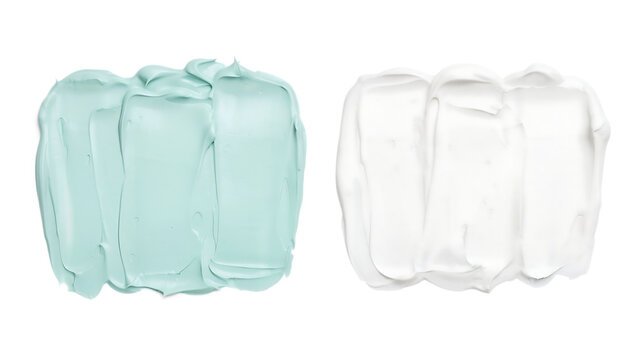 Two textured cosmetic cream swatches mint and white isolated on a transparent background desi