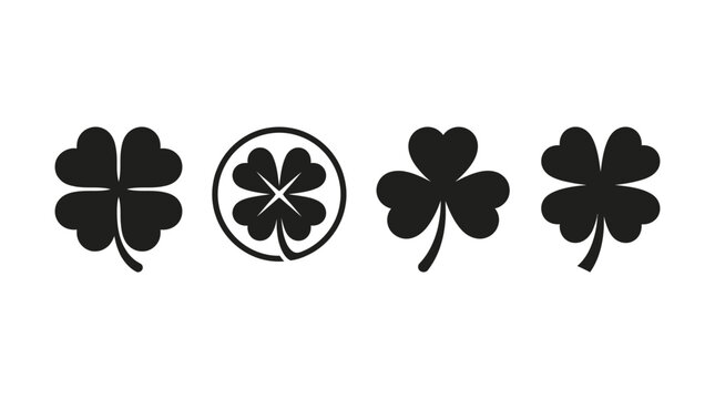 Four Black Clover Silhouettes On A White Background