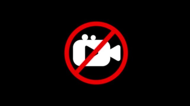 A white camera inside a red prohibition circle on a black background indicating that filming or recording is not allowed in this area