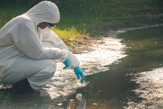 Scientist conducting water quality research to improve sanitation and environmental health.