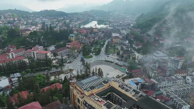Misty aerial view of Sa Pa town and surrounding mountains in Lao Cai, Vietnam