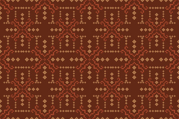 Modern Ikat geometric ethnic seamless pattern in luxury gold and terracotta. Traditional tribal embroidery motif background for textile, fabric, and fashion design. © Umpa 