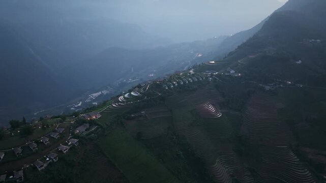 Aerial view of terraced rice fields and mountain resort in Sa Pa, Lao Cai, Vietnam