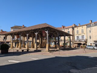 Fototapeta premium Historic medieval market hall in the town square of Belvès, France