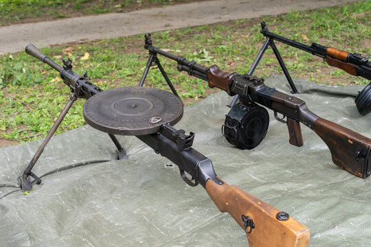 WW2 Soviet machine guns with round ammunition magazine