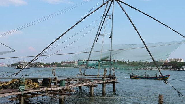 Chinese fishing nets on the shore of Kochi, Kerala in India, Cheena vala or tangkul, traditional stationary lift net