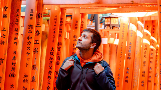Visitor at Fushimi Inari-Taisha's famous torii gates