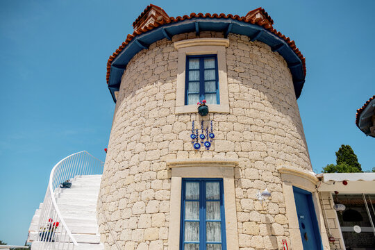 Charming circular stone building under clear sky