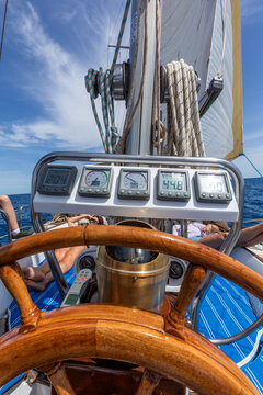 Wooden helm and ropes on Mediterranean  sailboat