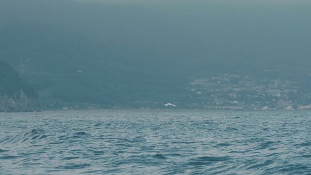 Distant Cityscape Across the Bay Viewed from an Inlet