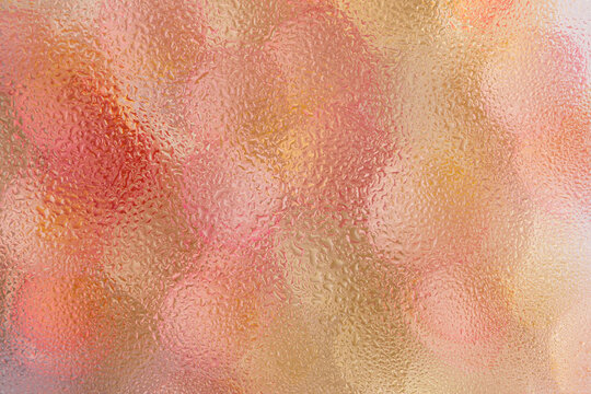 Beautiful floral background with water drops on glass