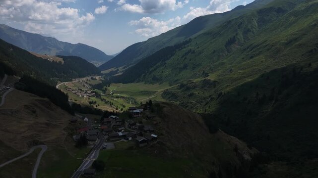 serene mountain landscape with green valleys and a clear sky, aerial view of natural beauty in outdoor mountainous terrain, travel and nature photography background.