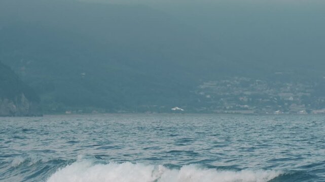 Distant Cityscape Across the Bay Viewed from an Inlet