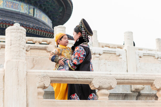 Woman and child in Traditional dress at Temple of Heaven