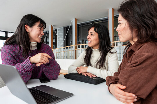 Group of women studying japanese lesson with laptop