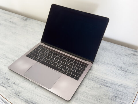 The laptop opens with a screen for mock-up. 