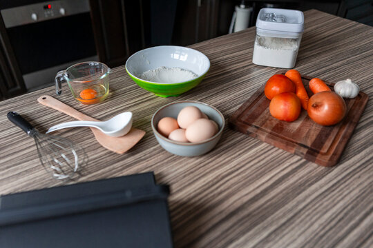 Preparation of home cooking ingredients on kitchen table