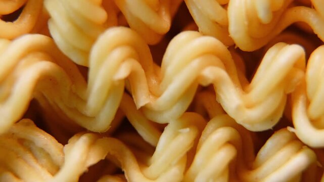 Macro Close Up of Instant Noodles Texture with Slow Horizontal Camera Slide.