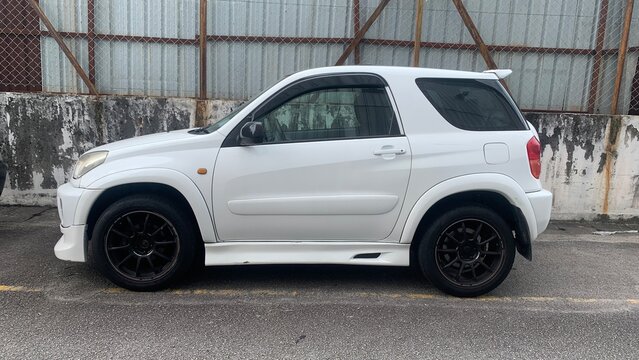 Selangor, Malaysia July 15th 2026- Toyota RAV4 3 door (XA20) parked beside an industrial fence