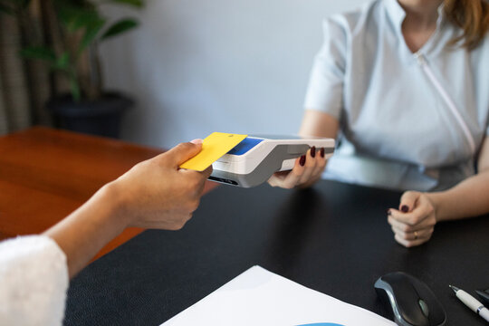 Patient payment at dental clinic front desk