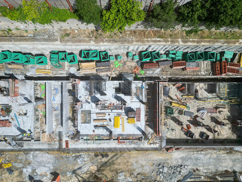 Aerial view of construction site with building materials