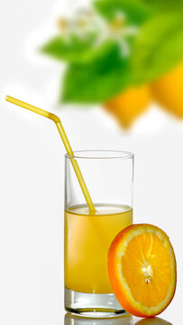 Fresh orange juice in a glass with a yellow straw and a slice of orange on a white background
