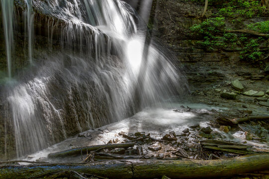 Beautiful Sherman Falls in Hamilton, Ontario, showcasing cascading waters and lush greenery, perfect for nature enthusiasts and photographers.