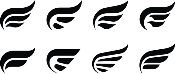Vector icon set of heraldic wings, tribal bird feather silhouettes, aviation speed and freedom emblems © kaiyum