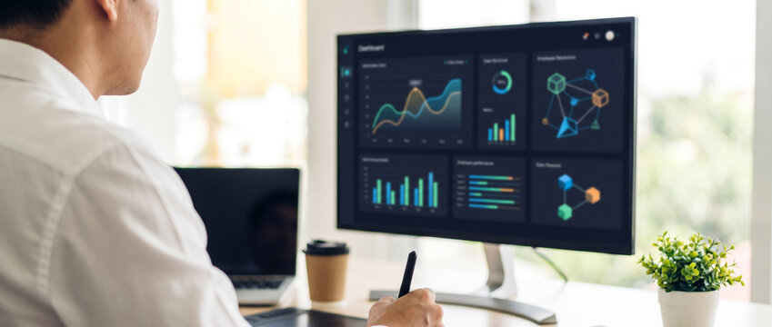 Manager reviews workforce analytics dashboard with employee KPIs, workflow metrics and collaboration insights, supporting performance management and enterprise operations with copy space.