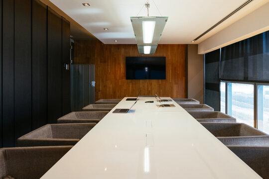Modern professional conference room with large meeting table
