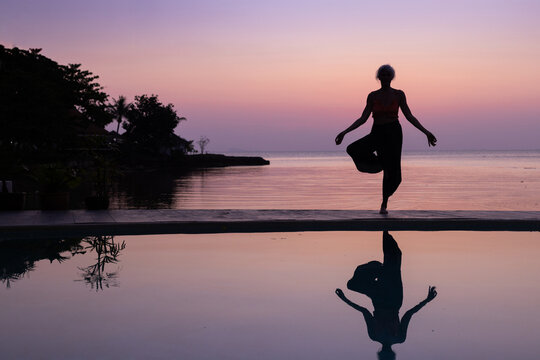 Yoga Balance and Mindfulness Concept, Woman Silhouette in Tree Pose