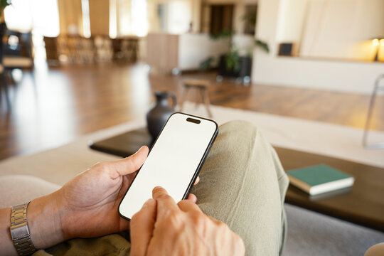 Anonymous woman browsing on smartphone
