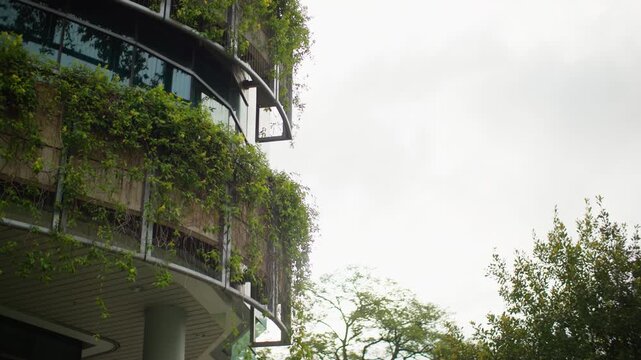 Green skyscrapers with innovative eco architecture in Singapore featuring lush building exteriors modern skyline views and vibrant urban tourism in Asia