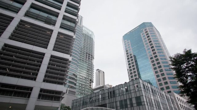 Singapore business district with stunning glass high rises modern financial buildings and remarkable metropolitan architecture creating an iconic cityscape in Asia