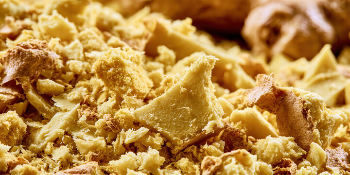 Close-up of crumbled spice mixture with dried ginger root